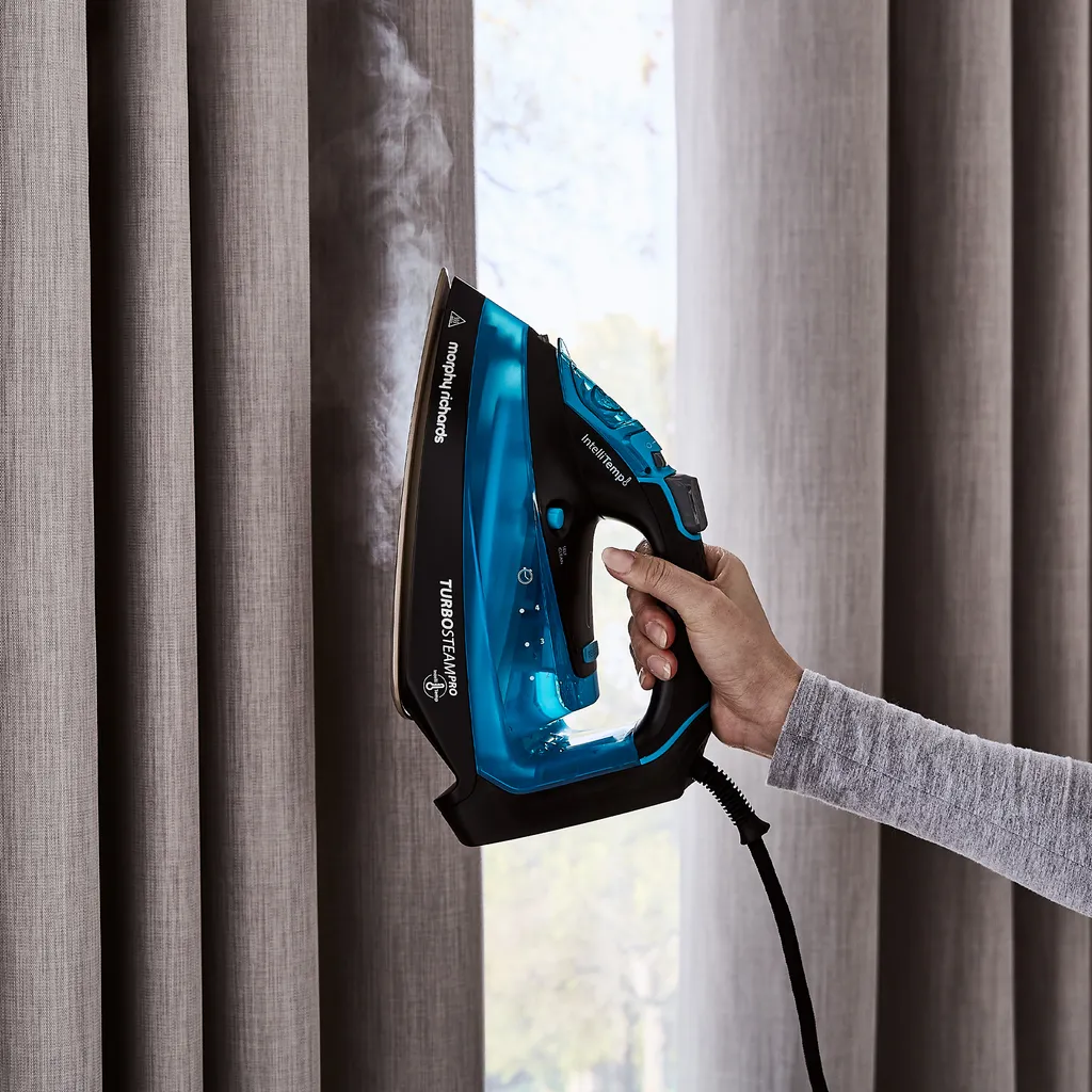 Morphy Richards 303210, Dampfbügeleisen, 3 M, 200 G/min, Schwarz, Blau, 40 G/min, 0,38 L 8 Morphy Richards 303210, Dampfbügeleisen, 3 M, 200 G/min, Schwarz, Blau, 40 G/min, 0,38 L – Bild 8